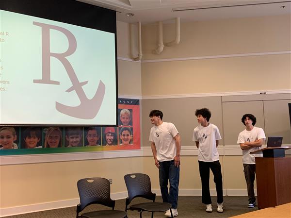 West Linn High School students present their idea to staff and administrators.